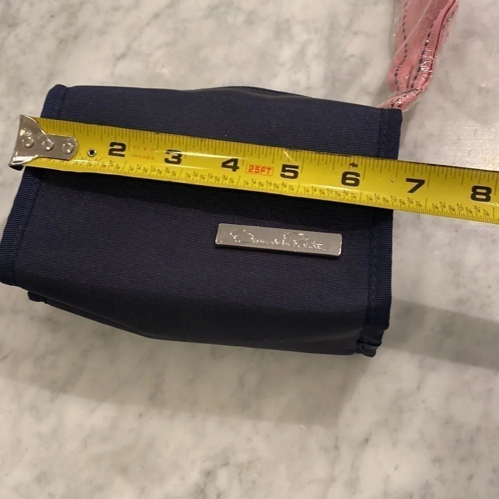 New No tag Oscar De La Renta small cosmetic case navy blue with pink ribbon